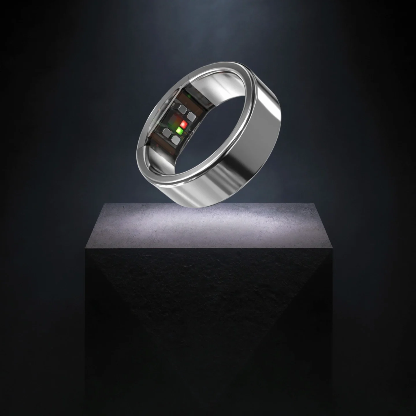 Concept render: a titanium ring on a stone pedestal